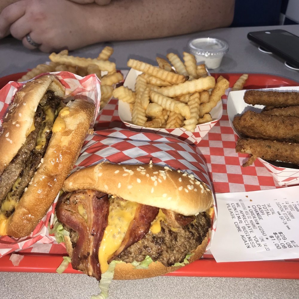 Avocado bacon cheeseburger  Triple cheeseburger  Two medium fries Zucchini sticks