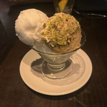 Russell's - Lemon  Sorbet - cookie has a pistachio crumble (very good ending to a savory dinner) - Steakhouses Near Me - Vail, Colorado