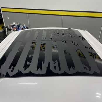Tint World - Matte black tattered American Flag - Car Window Tinting Near Me - Jacksonville, Florida Tint World - Matte black tattered American Flag - Car Window Tinting Near Me - Jacksonville, Florida