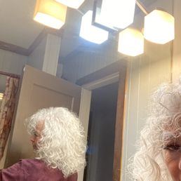 a woman with white curly hair a woman with white curly hair