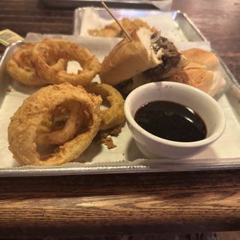 The Rookery - Steak Sandwich with Onion Rings - Bars Near Me - Macon, Georgia The Rookery - Steak Sandwich with Onion Rings - Bars Near Me - Macon, Georgia