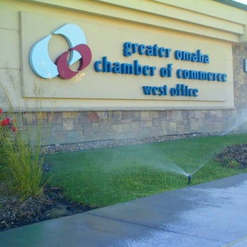 Rainmakers Irrigation - a water sprinkler in front of a sign that says greater quality chamber of commerce west office - Irrigation Near Me - Omaha, Nebraska Rainmakers Irrigation - a water sprinkler in front of a sign that says greater quality chamber of commerce west office - Irrigation Near Me - Omaha, Nebraska