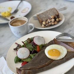 Mademoiselle Colette - Ham and cheese crepe, flat white and Hazelnut Cake, Slice