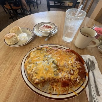 Vic's Daily Cafe - Vaqueros, Christmas chile, pinto beans, hashbrowns, eggs over easy, and biscuits with a side of gravy. - American Near Me - Albuquerque, New Mexico Vic's Daily Cafe - Vaqueros, Christmas chile, pinto beans, hashbrowns, eggs over easy, and biscuits with a side of gravy. - American Near Me - Albuquerque, New Mexico