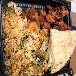 Taste of India - Vegetable Biriyani, Chicken Pakoras and homemade Naan. Incredibly delicious!!!