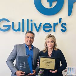 Gulliver's Travel Duck Creek Plaza - Funjet Vacations /ALG presenting us with a top sales award for 2018-19, thank you !