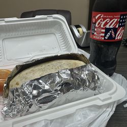 Before eating... it is definitely a large burrito. Lengua w lettuce tomato sour cream and cheese (no black beans)