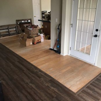 Romero's Flooring - Vinyl plank next a hardwood - Flooring Near Me Romero's Flooring - Vinyl plank next a hardwood - Flooring Near Me