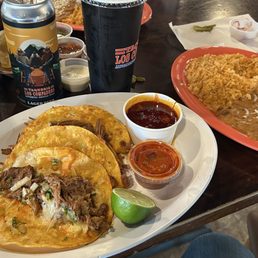 Quesabirria tacos, rice and beans, house lager Quesabirria tacos, rice and beans, house lager