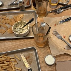 BJ's Restaurant & Brewhouse - This is an example of a table full of empty plates that should've been cleared!!