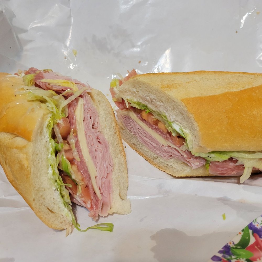 Jimmy's Famous Heros - a sub sandwich cut in half - Delis Near Me - Brooklyn, New York Jimmy's Famous Heros - a sub sandwich cut in half - Delis Near Me - Brooklyn, New York