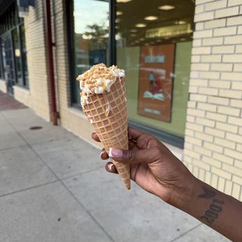 Alibi Cookies - The other side.. it's barely filling the cone & again barely any caramel - Bakeries Near Me - Hampton, Virginia
