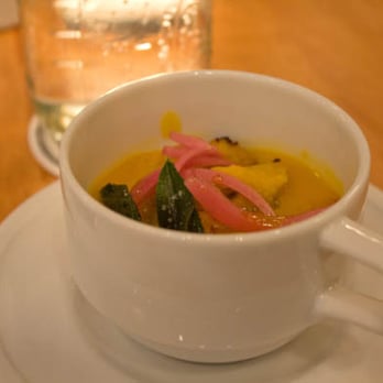 Pastaria - Cup of acorn squash soup - Italian Near Me - Clayton, Missouri Pastaria - Cup of acorn squash soup - Italian Near Me - Clayton, Missouri