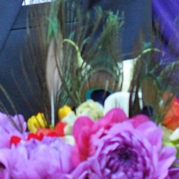 Soulflower Design Studio - Groom's boutonniere matched a few flowers from bridal bouquet - Floral Designers Near Me