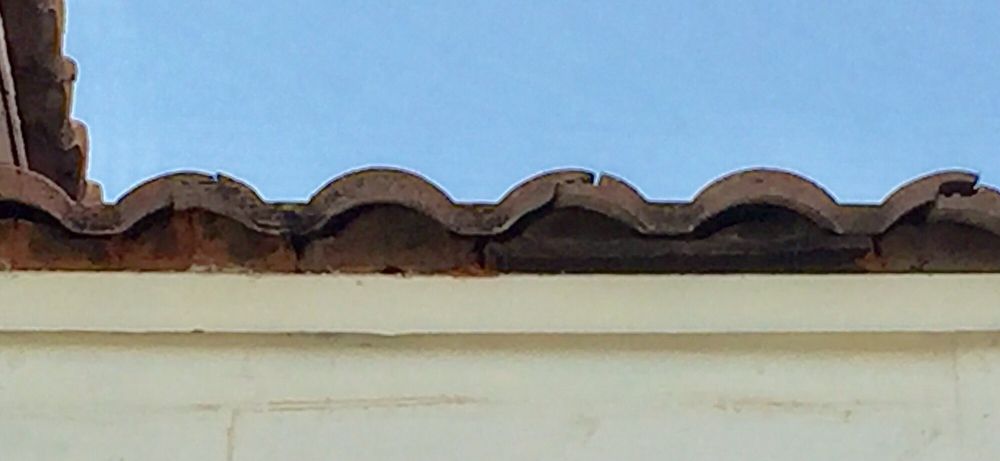 Slide of Arias Roofing