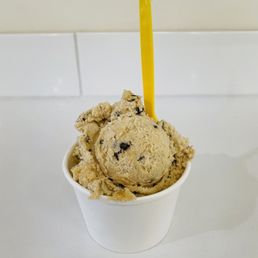 50/50 (One scoop of Ice Cream with One Scoop of Peanut Butter Chocolate Chip Edible Cookie Dough with Dark Chocolate Chips on top)