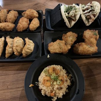 Kan Sushi - Fried oysters, pork gyoza, shrimp fried rice, fire chicken wings, & pork buns (we did not order this but hubby took it anyways) - Sushi Bars Near Me - Honolulu, Hawaii