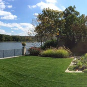 Best Buddies Landscaping - a view of a lake - Landscaping Near Me