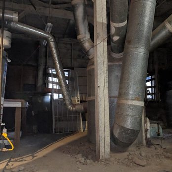 American Environmental Construction - giant furnace contains asbestos - Environmental Abatement Near Me - Seattle, Washington