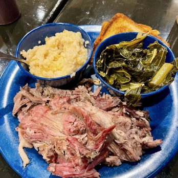 MOJO Smokehouse BBQ & Blues - Pulled pork plate with collard greens and smoked cheddar grits. - Barbeque Near Me - Fleming Island, Florida MOJO Smokehouse BBQ & Blues - Pulled pork plate with collard greens and smoked cheddar grits. - Barbeque Near Me - Fleming Island, Florida