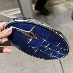 Here's the "manager" giving back my cracked emblem when I went back to get it and says they'll pay for it even if it's a small damage. Here's the "manager" giving back my cracked emblem when I went back to get it and says they'll pay for it even if it's a small damage.