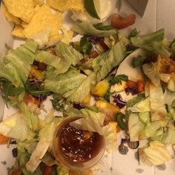 The Beach Hut - Fish tacos, with no avocado as advertised, uncooked tortillas, uncooked sweet peppers. Avoid