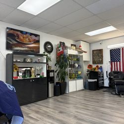V Barber Shop - TV on while you wait