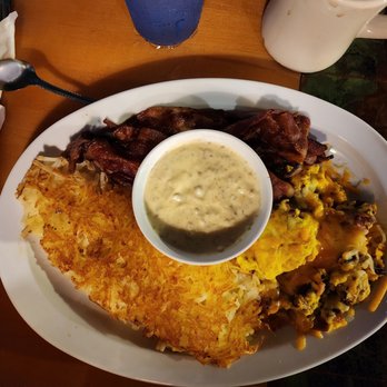 The Buttered Biscuit - The Old Standby with "extra" eggs and a side of the burger gravy - New American Near Me - Sumner, Washington The Buttered Biscuit - The Old Standby with "extra" eggs and a side of the burger gravy - New American Near Me - Sumner, Washington
