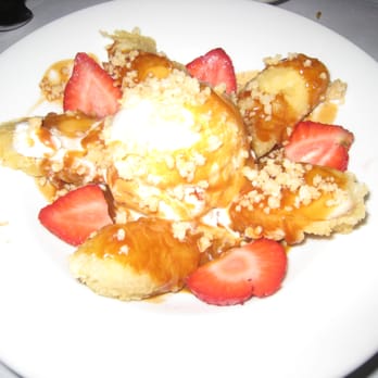 Flying Fish Grill - tempura banana fritter sundae with warm caramel sauce and fresh strawberries - Japanese Near Me - Carmel, California