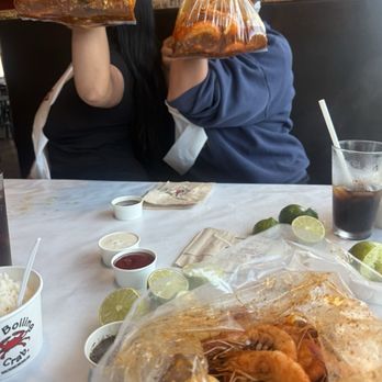 The Boiling Crab - TWO GIRLS WITH A LUXURIOUS BAG. - Cajun/Creole Near Me - Torrance, California The Boiling Crab - TWO GIRLS WITH A LUXURIOUS BAG. - Cajun/Creole Near Me - Torrance, California
