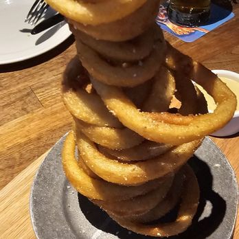 Yard House - Tower of crunchy onion rings - New American Near Me - Sacramento, California Yard House - Tower of crunchy onion rings - New American Near Me - Sacramento, California