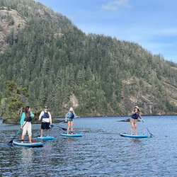 Pristine Paddleboard Adventures - People on paddleboards in Gordon Bay - Pristine Paddleboard Adventures