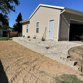 A & S Property Maintenance - a house with a garage - Landscaping Near Me A & S Property Maintenance - a house with a garage - Landscaping Near Me