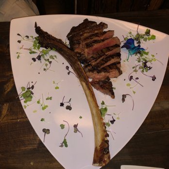 Bourbon Boulevard - 32oz dry aged tomahawk - Steakhouses Near Me - Chantilly, Virginia Bourbon Boulevard - 32oz dry aged tomahawk - Steakhouses Near Me - Chantilly, Virginia