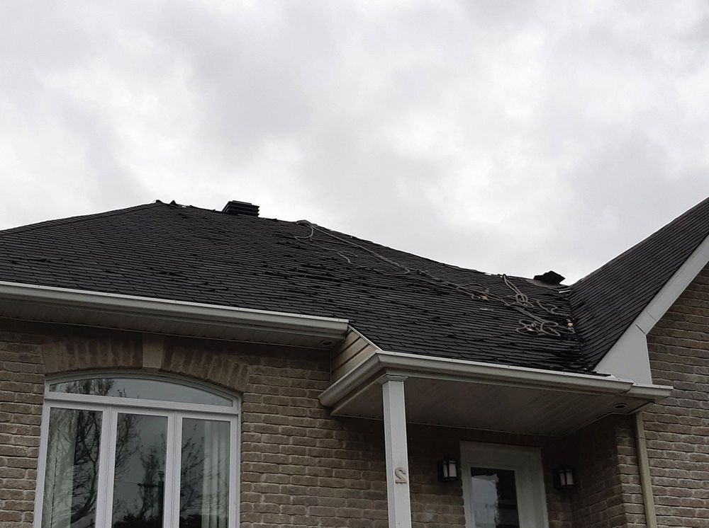 Slide of Bystrom Roofing