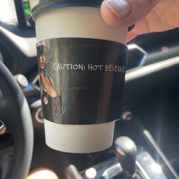 Bottoms Up Espresso - a hand holding a cup of coffee - Coffee & Tea Near Me - Marysville, California Bottoms Up Espresso - a hand holding a cup of coffee - Coffee & Tea Near Me - Marysville, California