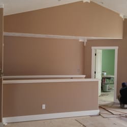 Tiberius Smith Construction - Here a couple of our trained carpenters working on a spec home where we installed all the cabinetry all the doors and casings...