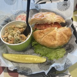 Chicken salad, with side of pasta salad, dill pickle on the side and cookie for dessert.