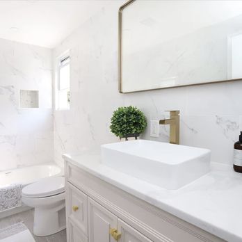 Schimmenti Construction - Brass and Marble Bathroom with custom vessel sink and custom countertop - General Contractors Near Me