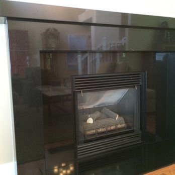 Monroe Marble & Granite - 2cm black absolute fireplace with mantle and inside surround installed. - Countertop Installation Near Me - Monroe, Washington
