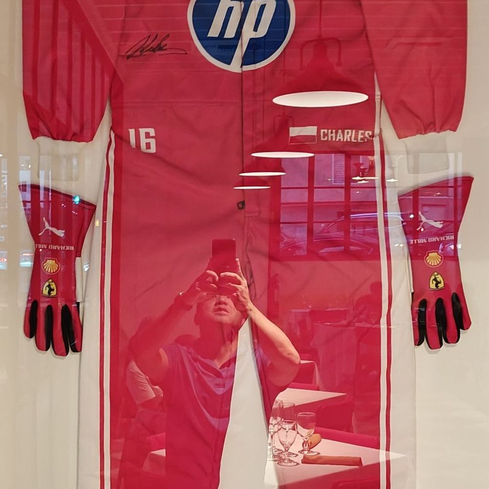 Maranello - Auto racing outfit mounted on a wall - Italian Near Me - San Diego, California