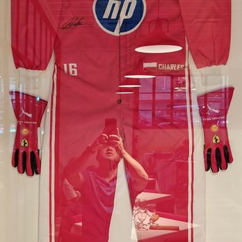 Maranello - Auto racing outfit mounted on a wall - Italian Near Me - San Diego, California Maranello - Auto racing outfit mounted on a wall - Italian Near Me - San Diego, California
