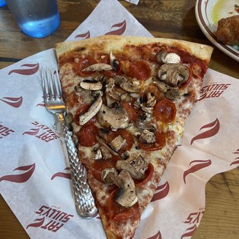 Atomic Cowboy - Broadway - Big ass slice (fork for scale) - Cocktail Bars Near Me - Denver, Colorado Atomic Cowboy - Broadway - Big ass slice (fork for scale) - Cocktail Bars Near Me - Denver, Colorado