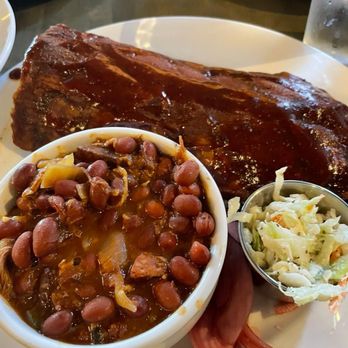 The Shaved Duck - Half rack of the most delicious ribs with baked beans and slaw. - Soul Food Near Me - St Louis, Missouri The Shaved Duck - Half rack of the most delicious ribs with baked beans and slaw. - Soul Food Near Me - St Louis, Missouri