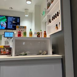 Rooster & Rice - Built in garbage can on their counters!