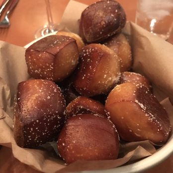 The Arrogant Butcher - Delicious dense perfectly salted pretzel bites that accompany the crack cheese fondue. - American Near Me - Phoenix, Arizona