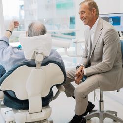 Sharp Dentistry & Associates - Dr. Bruno Sharp with Miami patient