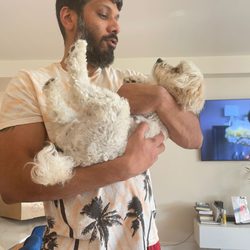 Vanity Pups - Nassar holding Teddie at home