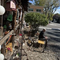 Aunt B's Vintage - My husband waiting for me on the bench outside.