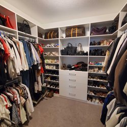 California Closets - Indianapolis - Custom walk-in closet with lots of hanging space and shelving for all your storage needs.